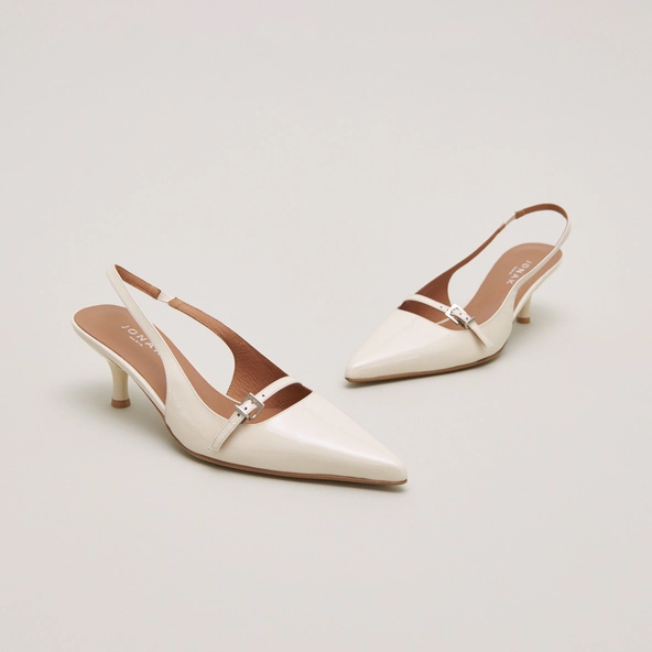 Heeled pumps in ecru patent | DAMOISELLE