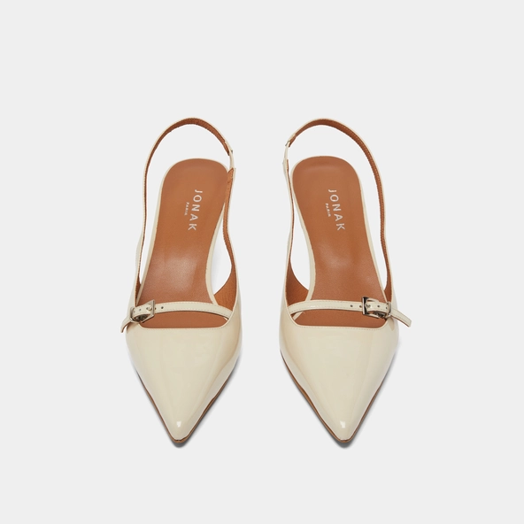 Heeled pumps in ecru patent | DAMOISELLE