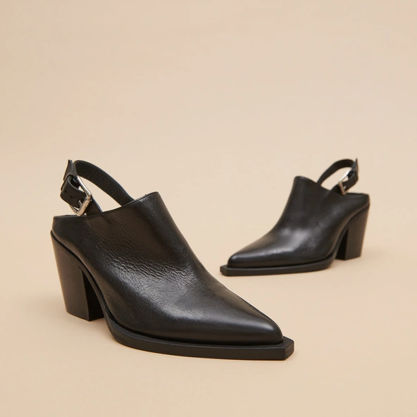 Mules with beveled heels in black leather | DOREN