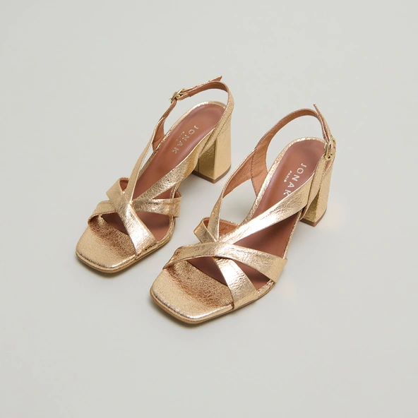 Heeled sandals in gold cracked leather | VANITY