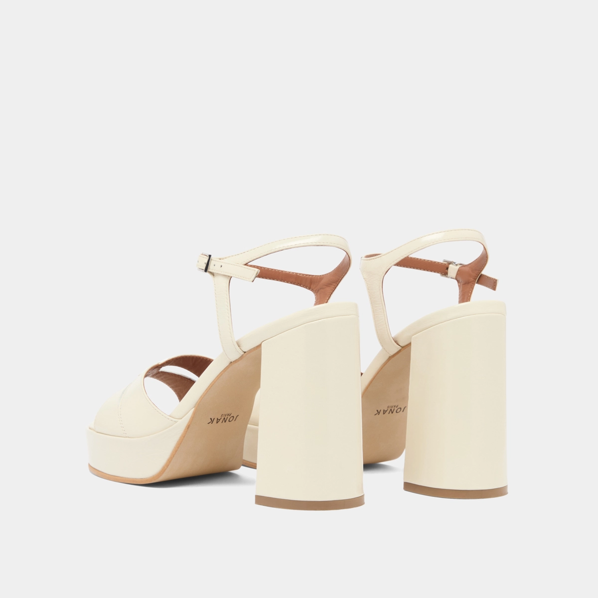 Platform sandals and high heels in ecru shiny leather | JUSTINE