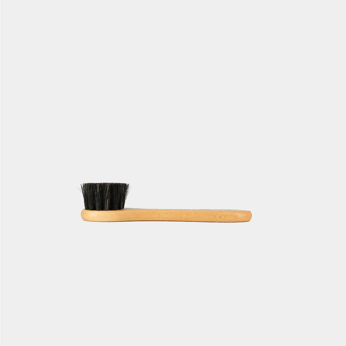 Circular dauber brush applies and spreads polish | circular dauber brush