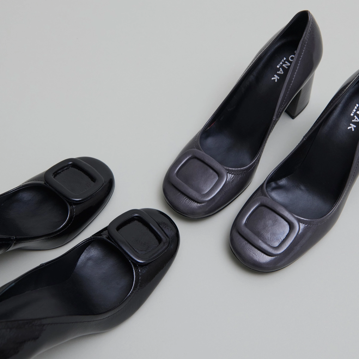 Pumps with buckles in black pleated patent | BISOU