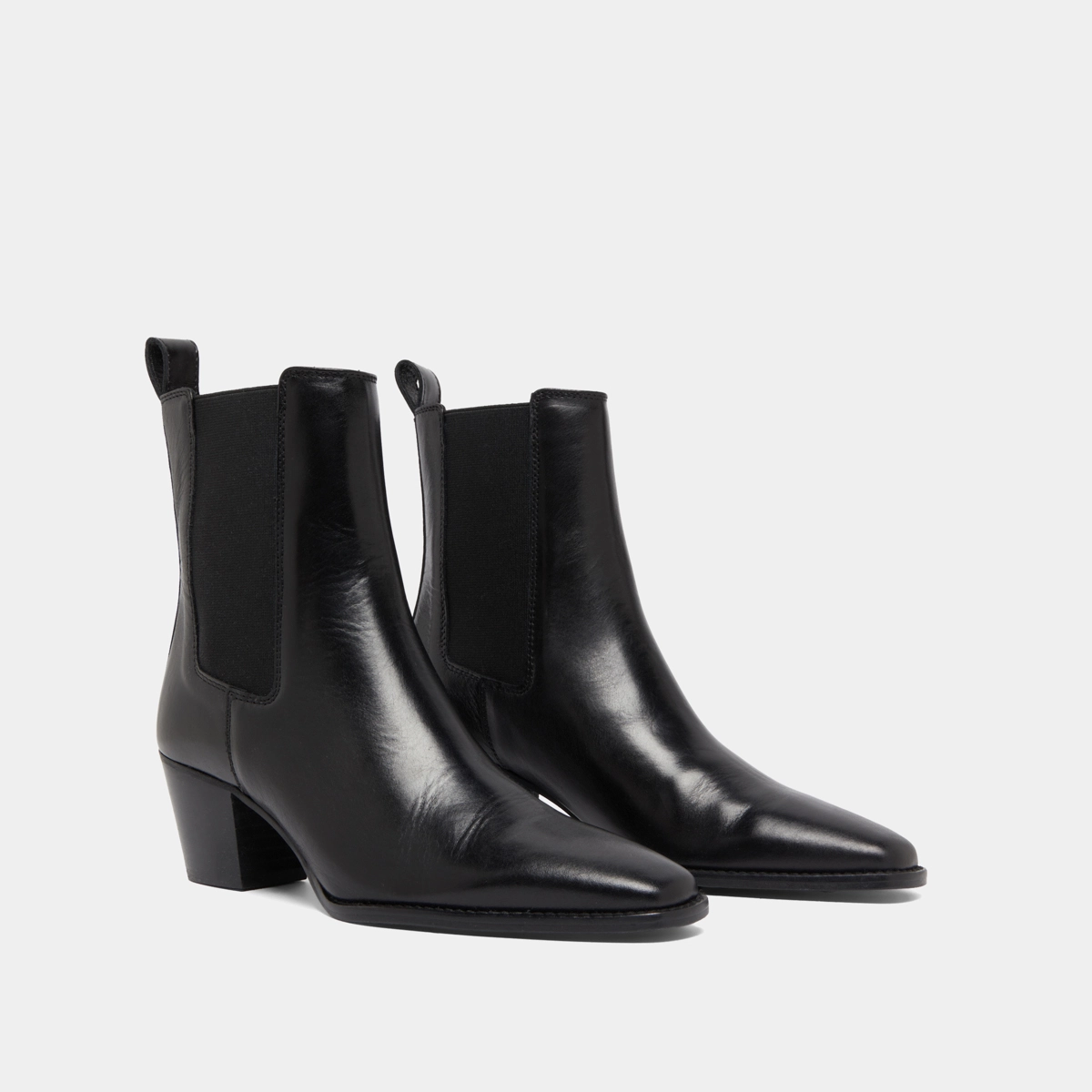 Ankle boots with beveled heels and pointed toes in black leather | BIRKIN