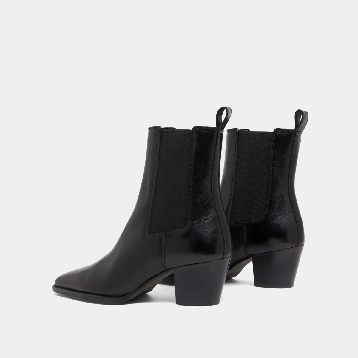 Ankle boots with beveled heels and pointed toes in black leather | BIRKIN