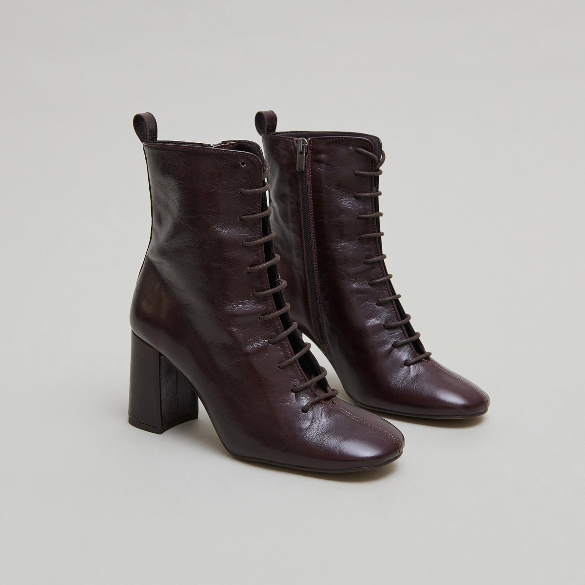Heeled and lace-up ankle boots in chocolate distressed leather | BOSE