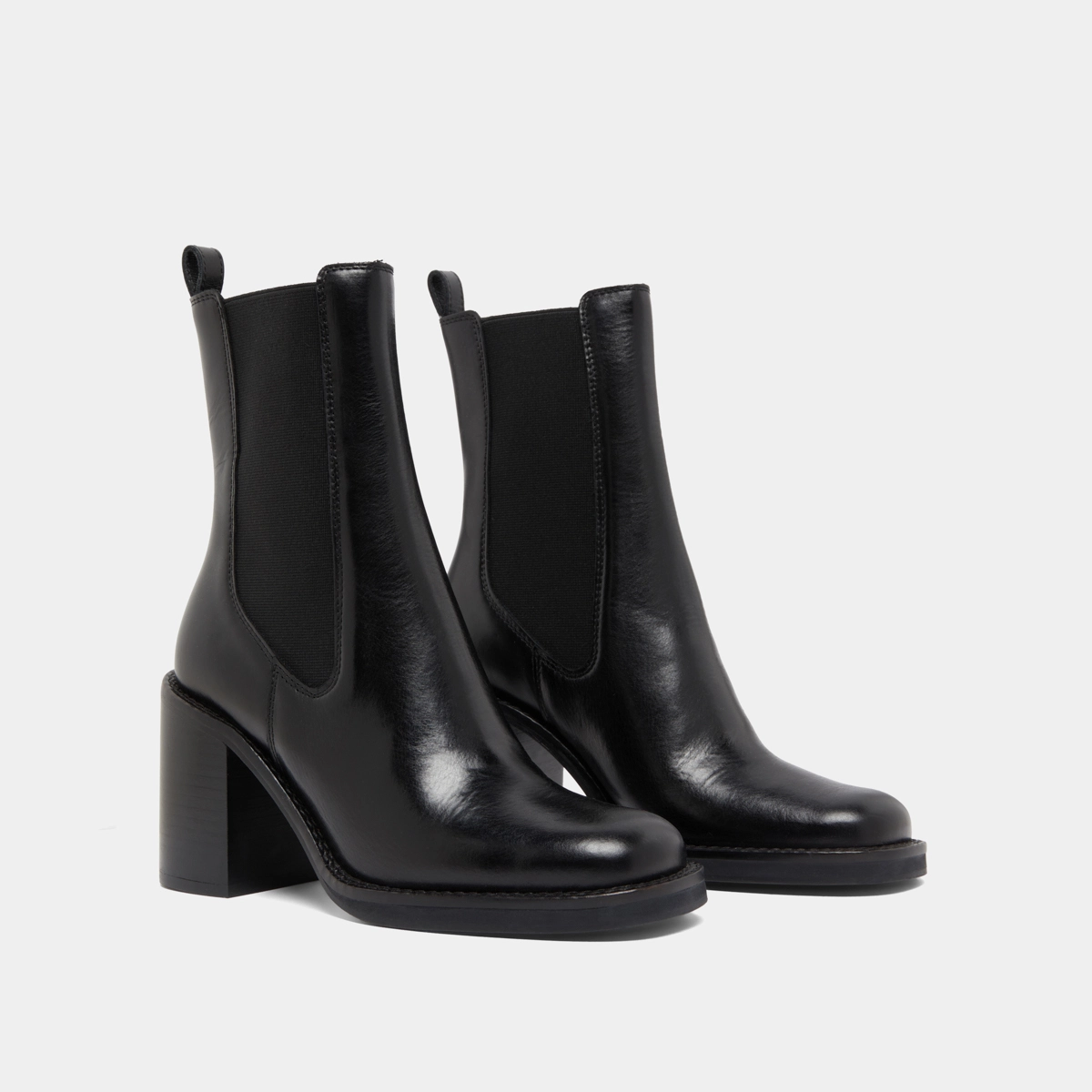 Ankle boots with overflowing heels in black leather | BRETZ