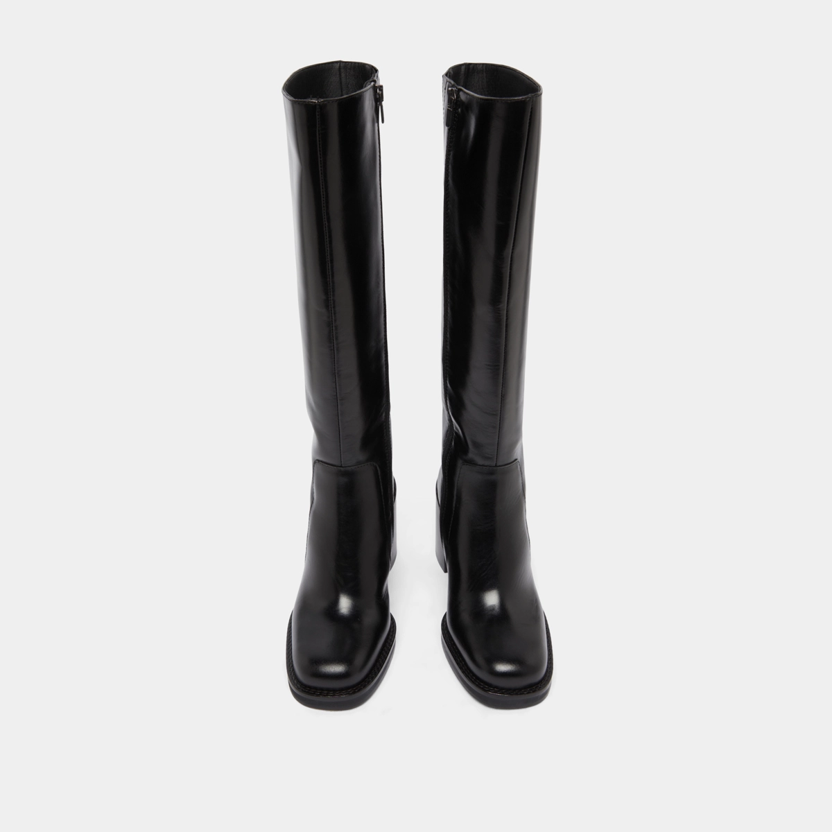 Boots with overflowing heels in black leather | BRETZEL