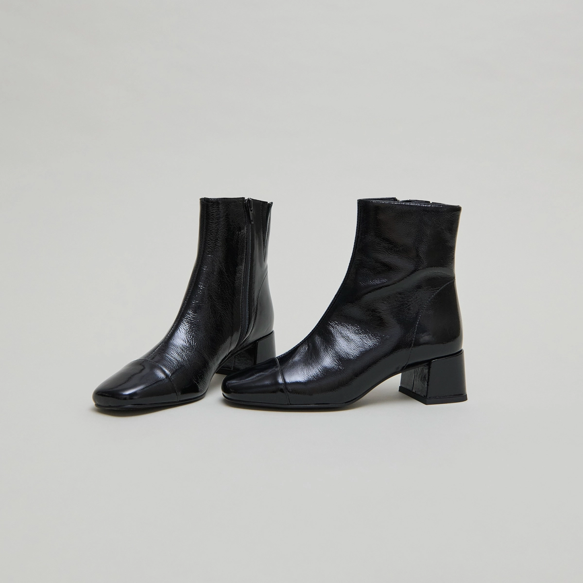 Ankle boots with zips in black pleated patent leather | DOMENICA