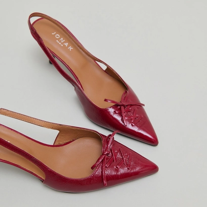 Pumps with open backs in carmine red shiny leather | DOLENE