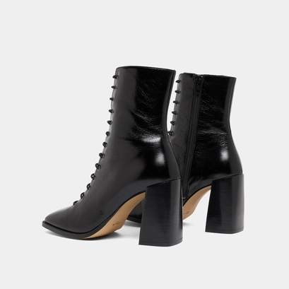 Heeled ankle boots with laces in black distressed leather | vandelle