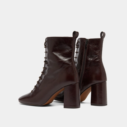Heeled and lace-up ankle boots in chocolate distressed leather | bose