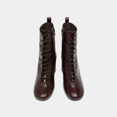 Heeled and lace-up ankle boots in chocolate distressed leather | bose