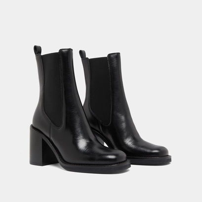 Ankle boots with overflowing heels in black leather | bretz