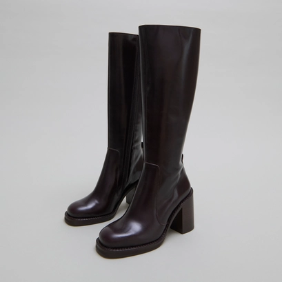 Boots with overflowing heels in dark brown leather | bretzel