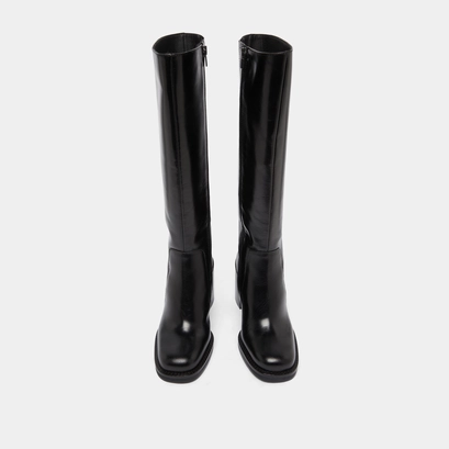 Boots with overflowing heels in black leather | bretzel