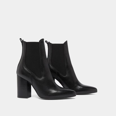 Heeled ankle boots with pointed toes in black grained leather | brook