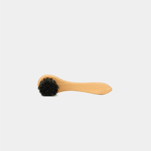 Circular dauber brush applies and spreads polish | circular dauber brush